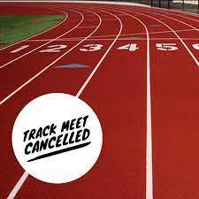 This is a picture of a red running tracl with the words "Track meet cancelled" 