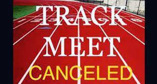 this is a picture of a red running track with the words, Track Meet Canceled