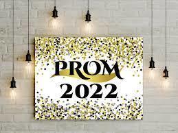 This is a picture of a sign that reads Prom 2022